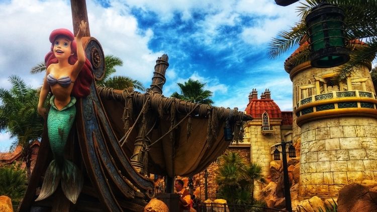 voyage of the little mermaid ride entrance, magic kingdom