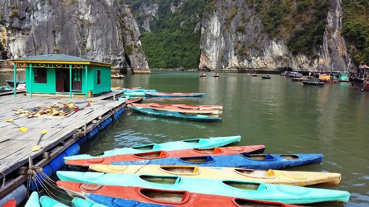 kayaks in ha long bay, a recommended solo beach vacation destination