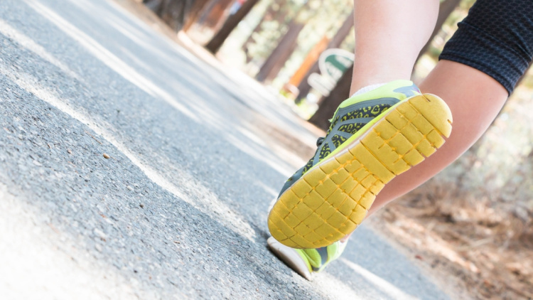 Lacing up a pair of running shoes like these ones and exploring a destination on foot is a part of sustainable solo travel